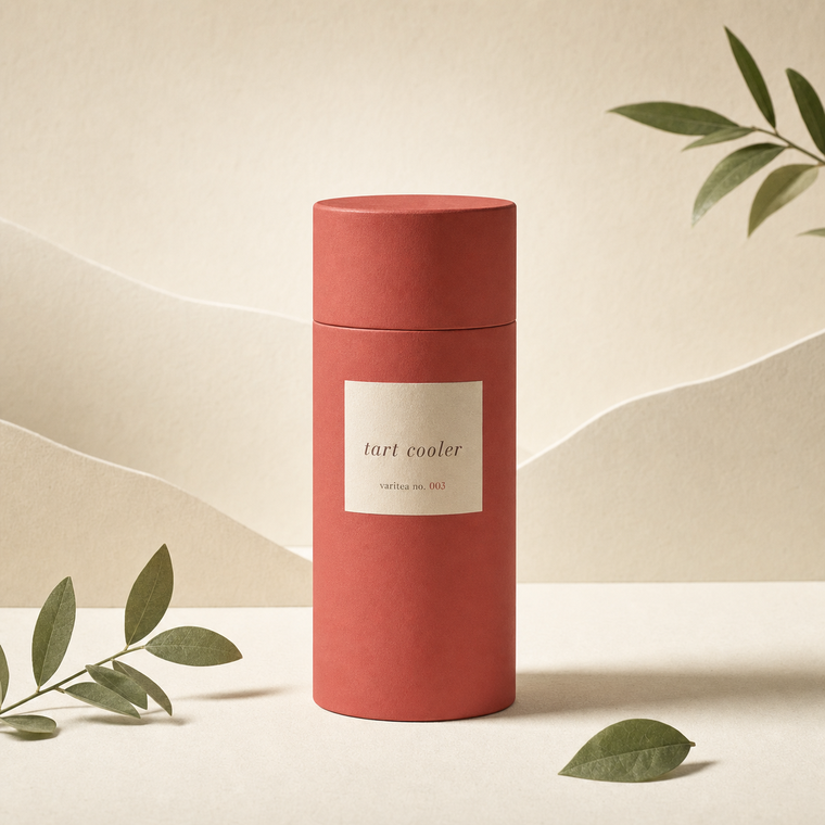 Tart Cooler tea canister in warm hibiscus terracotta with a cream label